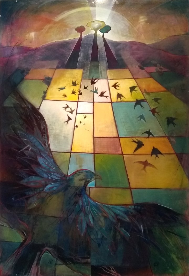 A bird looking at a grouping of birds flying above rural fields with a sunrise over mountains in the distance.